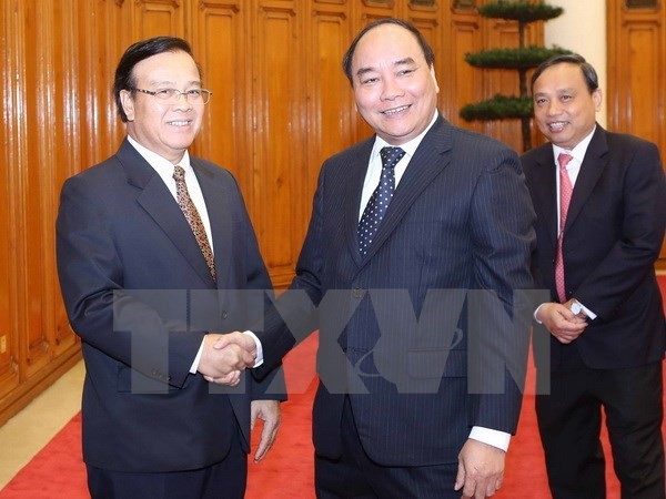 Deputy PM seeks Laos’ support for Vietnam-invested projects - ảnh 1
